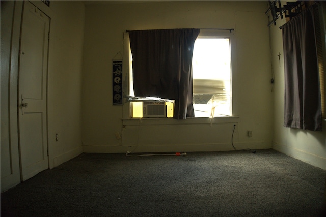1530 Southerland Ave, Dallas, TX 75203 - carpeted spare room featuring baseboards and cooling unit