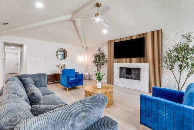 4043 Flintridge Dr, Dallas, TX 75244 - living area featuring lofted ceiling with beams, attic access, visible vents, a ceiling fan, and wood finished floors
