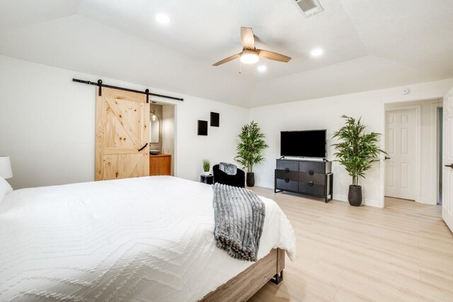 4043 Flintridge Dr, Dallas, TX 75244 - bedroom featuring a barn door, visible vents, recessed lighting, light wood-style floors, and ceiling fan