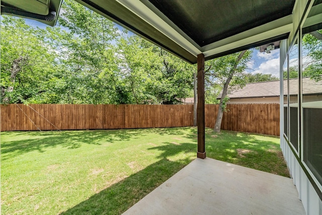 view of yard featuring a patio area and a fenced backyard