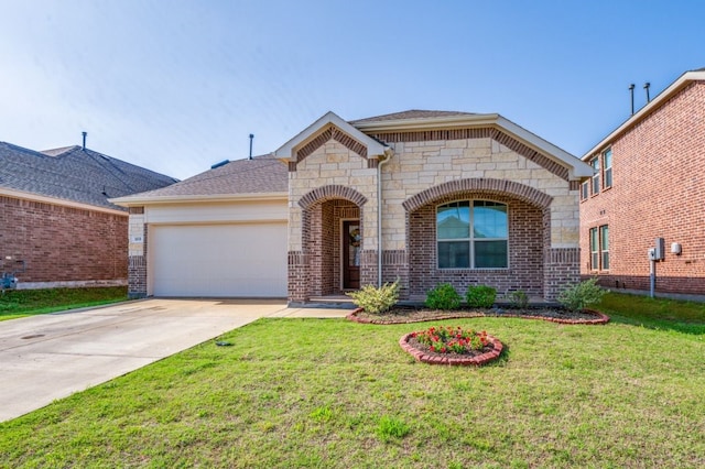 view of front of house with a front yard, brick siding, concrete driveway, an attached garage, and stone siding