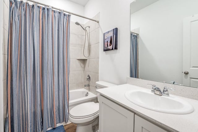 full bath featuring toilet, shower / bathtub combination with curtain, wood finished floors, and vanity