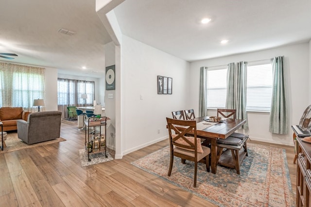 dining area with recessed lighting, a ceiling fan, light wood-style flooring, and baseboards