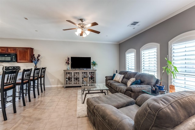 575 S Virginia Hills Dr Unit 1502, Mckinney, TX 75072 - living room featuring ceiling fan, light tile patterned floors, and ornamental molding