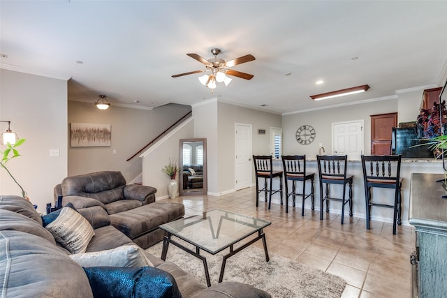 575 S Virginia Hills Dr Unit 1502, Mckinney, TX 75072 - living area featuring light tile patterned floors, stairway, ceiling fan, baseboards, and crown molding