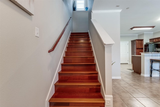 575 S Virginia Hills Dr Unit 1502, Mckinney, TX 75072 - staircase with tile patterned flooring, crown molding, and baseboards