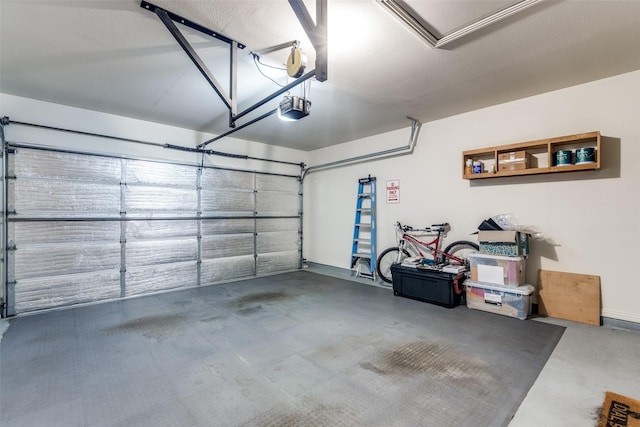 575 S Virginia Hills Dr Unit 1502, Mckinney, TX 75072 - garage with a garage door opener