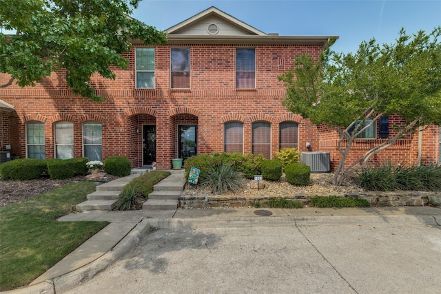 575 S Virginia Hills Dr Unit 1502, Mckinney, TX 75072 - view of front of house with central AC unit and brick siding