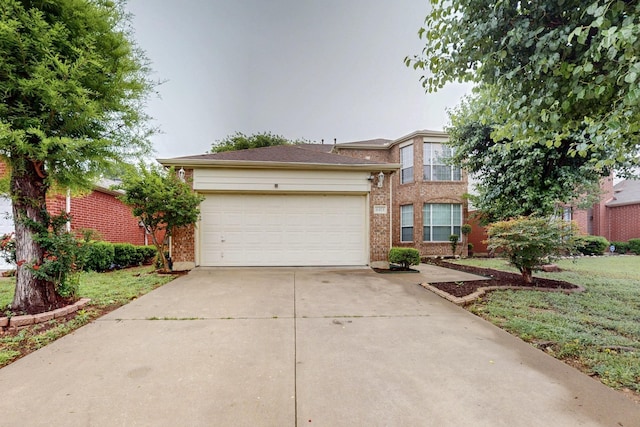 8413 Vicksburg Ln, Fort Worth, TX 76123 - view of front of property with brick siding, driveway, and an attached garage