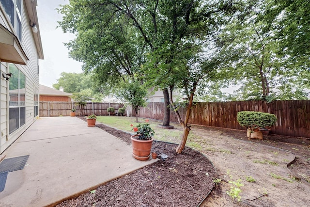 8413 Vicksburg Ln, Fort Worth, TX 76123 - fenced backyard with a patio