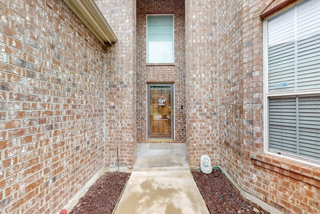 8413 Vicksburg Ln, Fort Worth, TX 76123 - doorway to property with brick siding