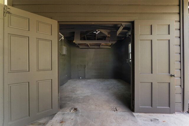 interior space featuring concrete flooring