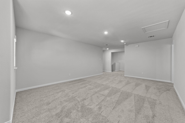 spare room with visible vents, baseboards, carpet flooring, and recessed lighting