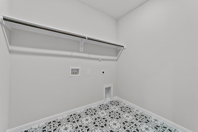 laundry area featuring baseboards, washer hookup, hookup for a gas dryer, electric dryer hookup, and laundry area
