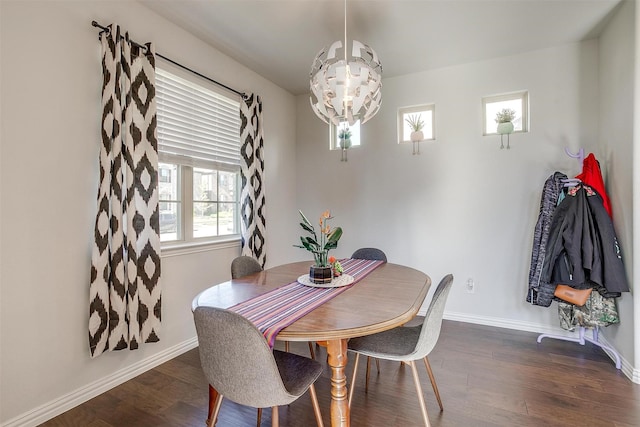 16900 Sophora Ave, Justin, TX 76247 - dining area with a notable chandelier, baseboards, and dark wood-type flooring
