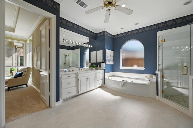 full bath featuring a stall shower, visible vents, crown molding, a garden tub, and vanity