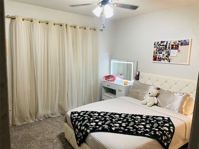 carpeted bedroom with a ceiling fan