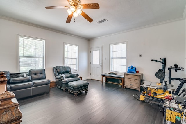 14357 Fm 1392, Terrell, TX 75160 - living area with wood finished floors, visible vents, a ceiling fan, and ornamental molding