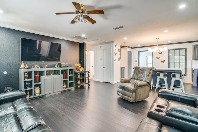 14357 Fm 1392, Terrell, TX 75160 - living area with dark wood finished floors, visible vents, and ornamental molding