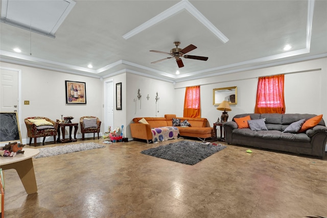 living area with attic access, a ceiling fan, a tray ceiling, and recessed lighting