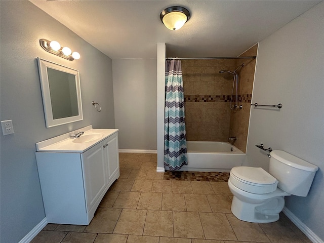 bathroom featuring tile patterned flooring, toilet, vanity, shower / bath combo with shower curtain, and baseboards