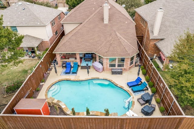 10625 Sexton Dr, Mckinney, TX 75072 - view of swimming pool with a fenced backyard, a patio area, and an outdoor living space