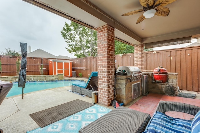 10625 Sexton Dr, Mckinney, TX 75072 - fenced backyard with an outdoor kitchen, a storage unit, ceiling fan, and a patio
