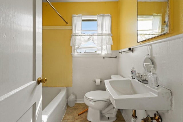 full bath with tile patterned flooring, a sink, and toilet