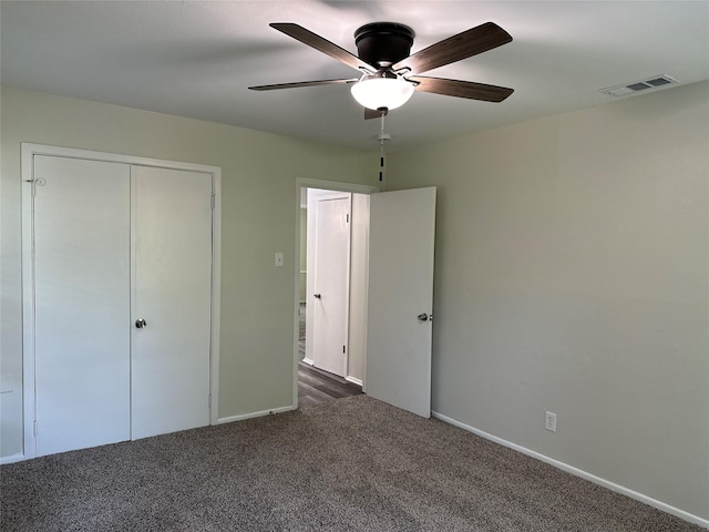 1928 Las Cruces Ln, Dallas, TX 75217 - unfurnished bedroom with baseboards, a ceiling fan, visible vents, and carpet