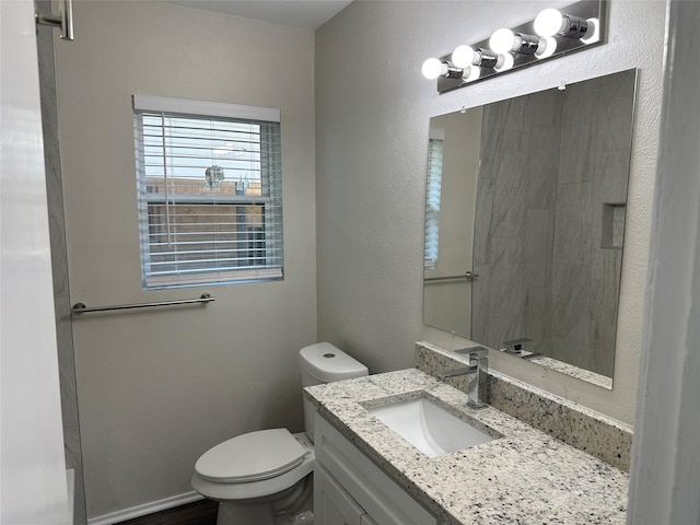 1928 Las Cruces Ln, Dallas, TX 75217 - bathroom with vanity and toilet