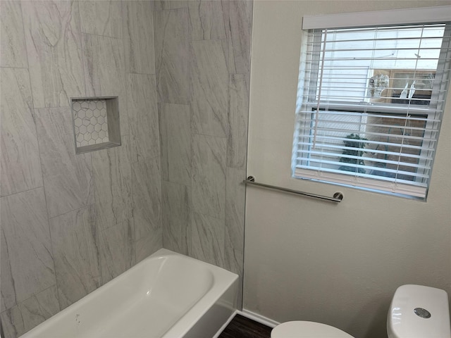 1928 Las Cruces Ln, Dallas, TX 75217 - bathroom with bathing tub / shower combination and toilet