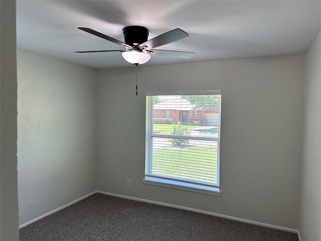 1928 Las Cruces Ln, Dallas, TX 75217 - spare room featuring dark carpet, ceiling fan, a wealth of natural light, and baseboards
