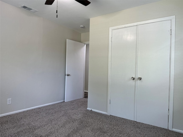 1928 Las Cruces Ln, Dallas, TX 75217 - unfurnished bedroom featuring a closet, ceiling fan, carpet, baseboards, and visible vents