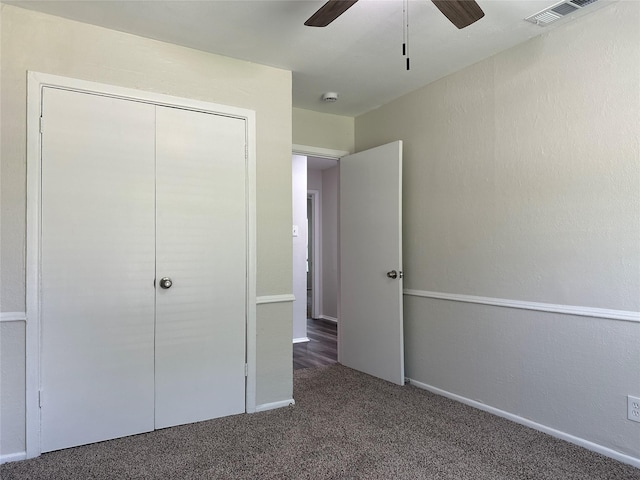 1928 Las Cruces Ln, Dallas, TX 75217 - unfurnished bedroom featuring baseboards, visible vents, a closet, ceiling fan, and carpet floors