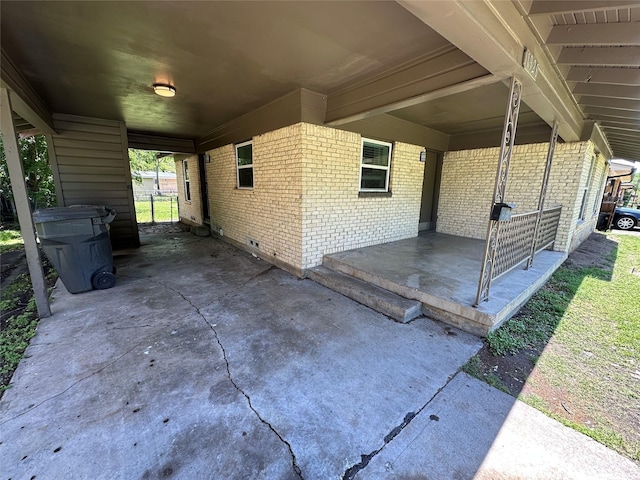 1928 Las Cruces Ln, Dallas, TX 75217 - view of patio with an attached carport