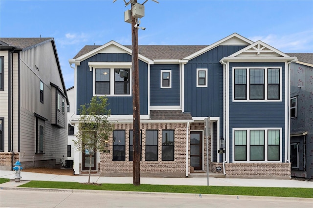 913 Janwood Dr, Plano, TX 75075 - townhome / multi-family property with brick siding and board and batten siding