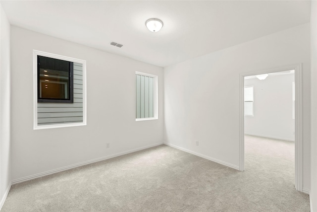 913 Janwood Dr, Plano, TX 75075 - carpeted empty room with baseboards