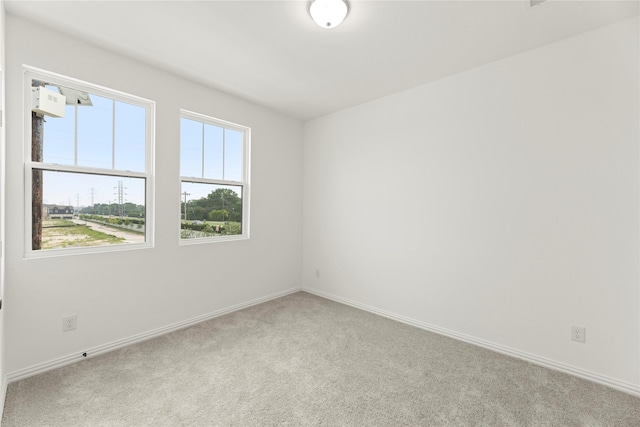 913 Janwood Dr, Plano, TX 75075 - carpeted empty room with baseboards