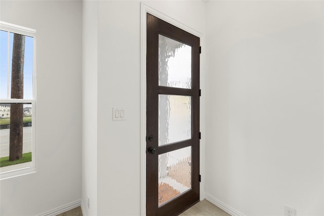 913 Janwood Dr, Plano, TX 75075 - entryway with baseboards and light wood-type flooring