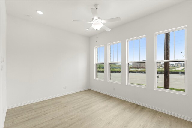 913 Janwood Dr, Plano, TX 75075 - empty room with light wood finished floors, baseboards, a ceiling fan, and recessed lighting