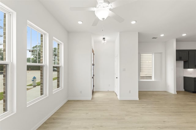 913 Janwood Dr, Plano, TX 75075 - unfurnished living room with light wood-style floors, recessed lighting, baseboards, and a ceiling fan