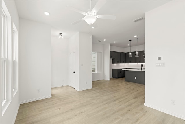 913 Janwood Dr, Plano, TX 75075 - unfurnished living room with recessed lighting, light wood finished floors, ceiling fan, and baseboards