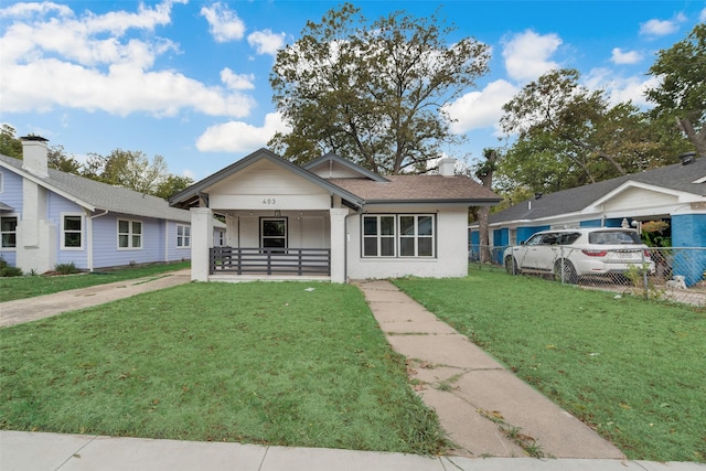 403 S Marlborough Ave, Dallas, TX 75208 - view of front facade featuring covered porch and a chimney