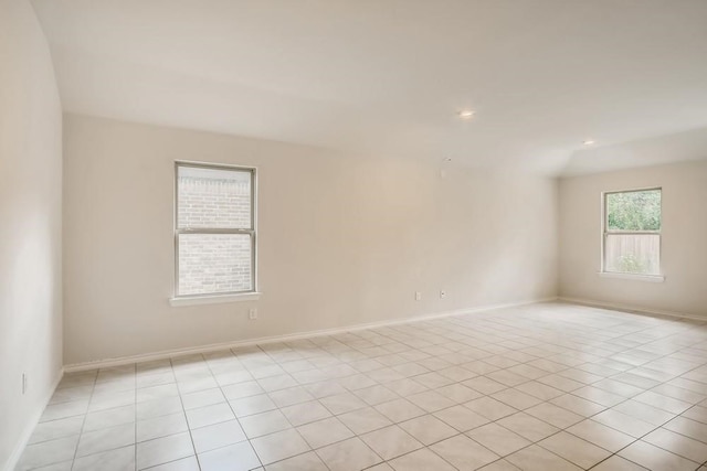 2235 Vance Dr, Forney, TX 75126 - empty room with recessed lighting, baseboards, and light tile patterned floors