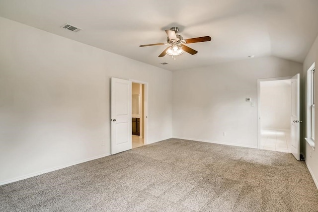 2235 Vance Dr, Forney, TX 75126 - spare room featuring vaulted ceiling, ceiling fan, carpet, baseboards, and visible vents