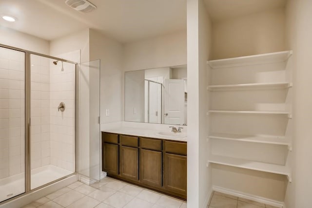 2235 Vance Dr, Forney, TX 75126 - bathroom with vanity, tile patterned flooring, and a stall shower