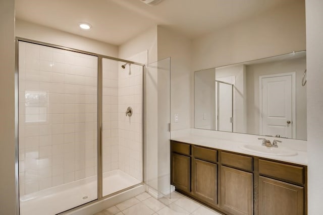 2235 Vance Dr, Forney, TX 75126 - bathroom with a shower stall, vanity, and tile patterned floors