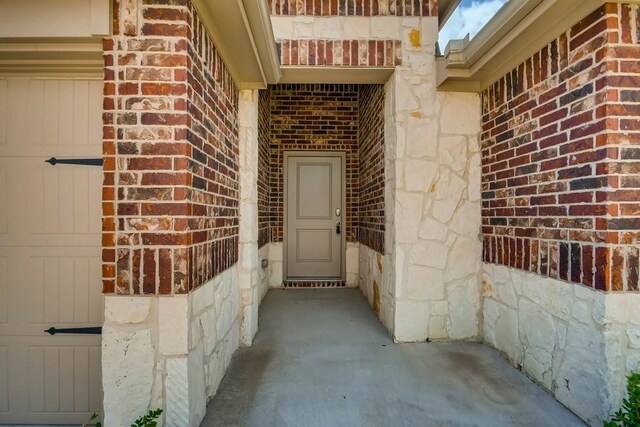 2235 Vance Dr, Forney, TX 75126 - doorway to property with brick siding and stone siding