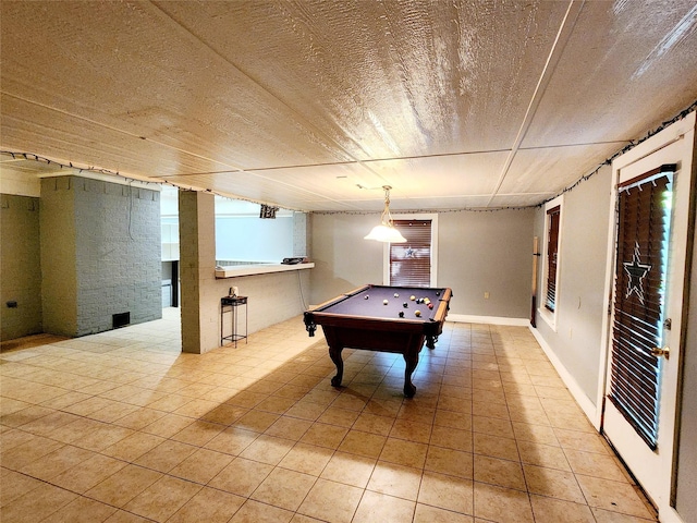 rec room featuring a healthy amount of sunlight, pool table, and light tile patterned floors