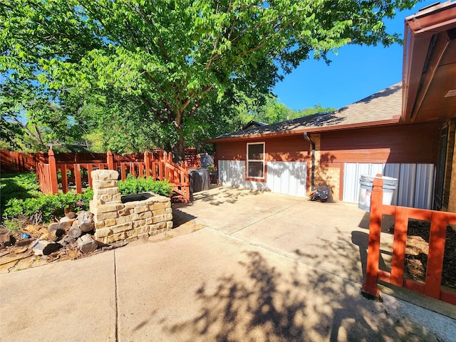 view of patio / terrace with fence